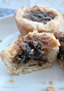 the best butter tarts ever, cut open with a flakey crust and filled with currants.