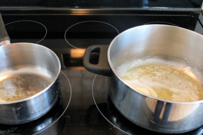 Butter being melted in two different saucepans.