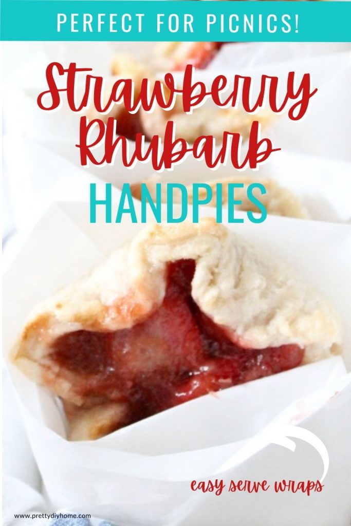 Individual rustic strawberry rhubarb tarts wrapped in parchment for easy serving.