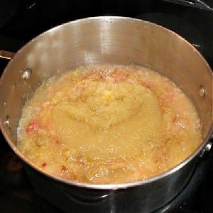 Cooking a large pot of the apples for the Best apple butter recipe.