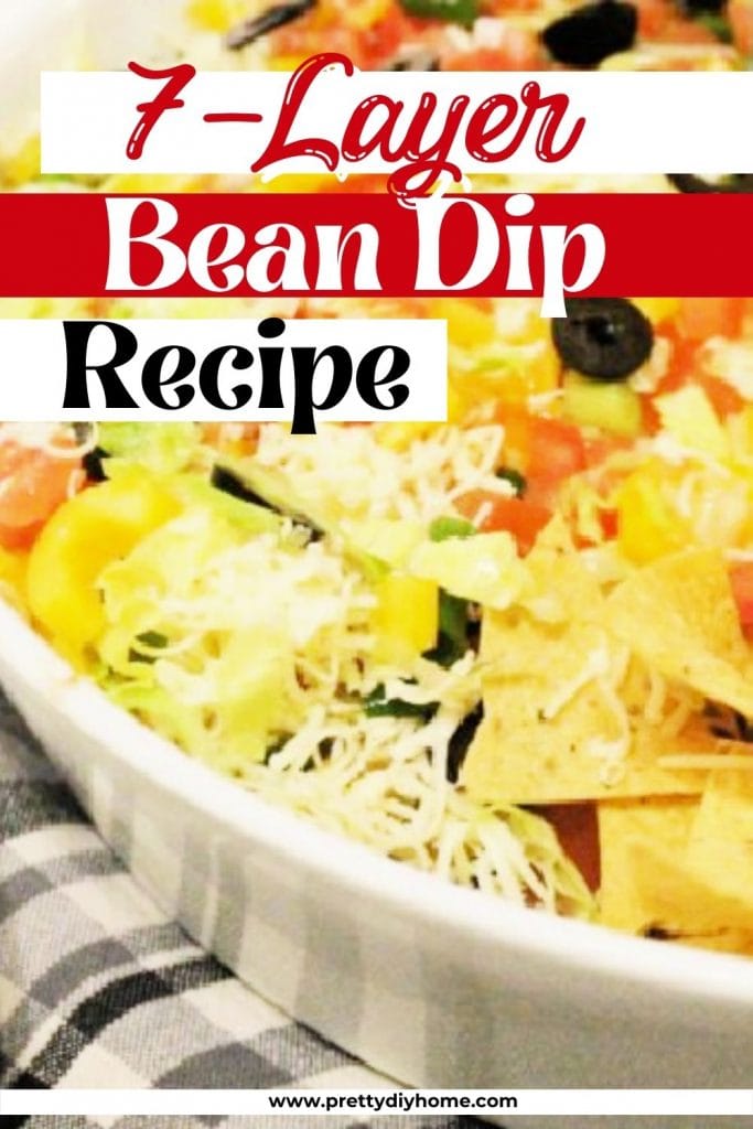 A seven layer dip recipe with beans, taco seasoning, cheese, salsa, sour cream, lettuce, tomatoes, and olives
