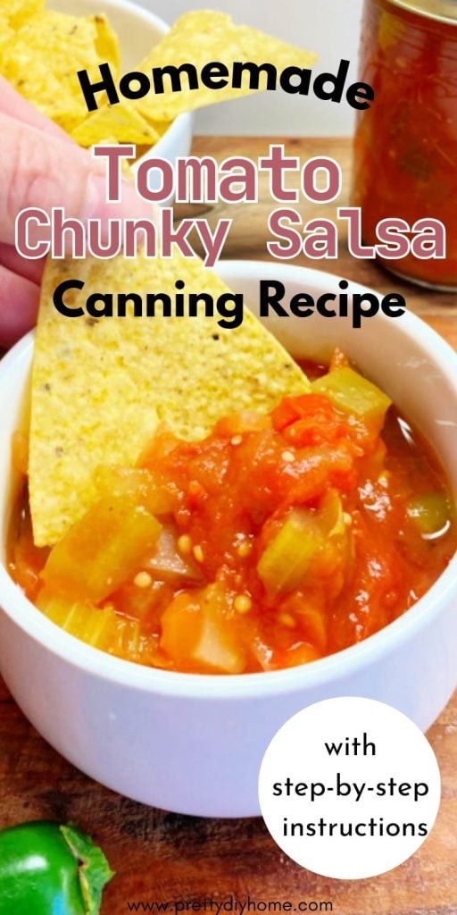 A small bowl fulled with brightly colored tomato salsa.  A man is dipping a tortilla chip into it.  The overlaying text says Homemade Tomato Chunky Salsa Canning Recipe.