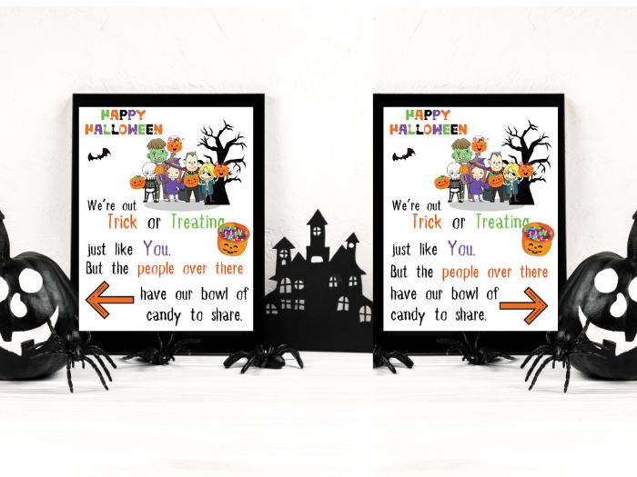 Two Printable Halloween candy signs, each directing the trick and treaters to a neighbors house. With an arrow pointing in the right direction. The signs are identical except for the direction arrows and say Happy Halloween We're out Trick or Treating just like You. but the people over there have our bowl of candy to share. Its designed with a large group of cartoon people in different Halloween costumes.