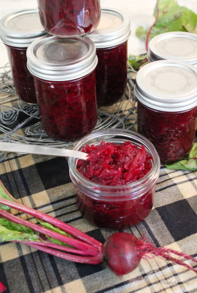 Homemade beet relish with horseradish in a glass jar.