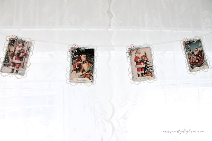 Close up of the central four panels of the vintage Santa banner.