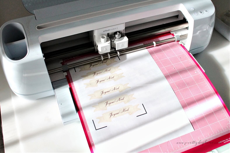 Printed Joyeux Noel ribbon banners on cardstock for the DIY vintage Santa banner,