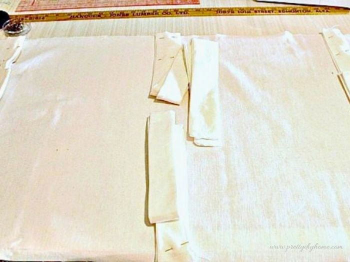 ie placement on a DIY bench cushion back showing where to attach fabric ties before sewing.