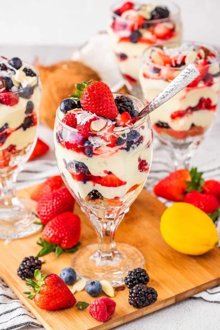 Mixed berry parfait layered with strawberries, blueberries, blackberries, and creamy pudding.
