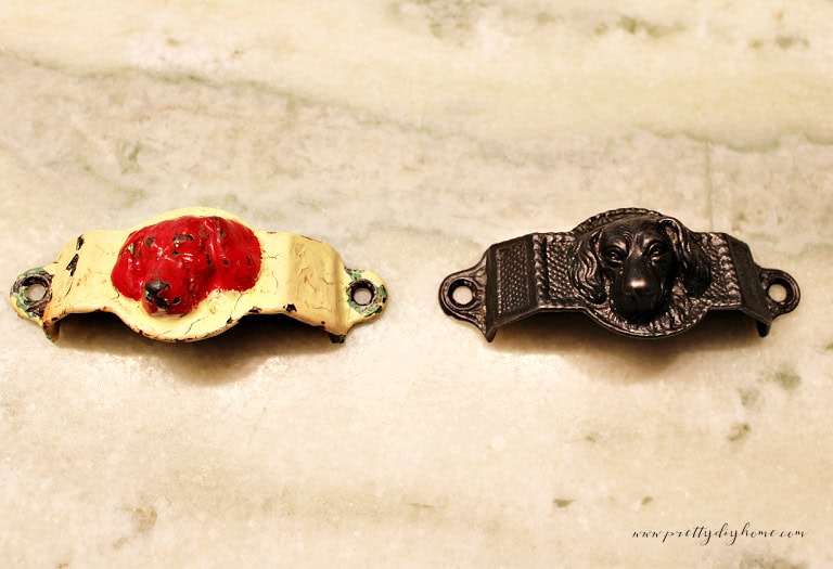 Vintage dog head cabinet hardware before and after restoration during an antique cabinet makeover project.