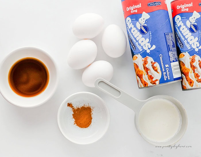 Ingredients for cinnamon roll muffins including cinnamon rolls, eggs, milk, vanilla, and cinnamon.