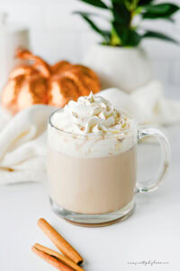 Homemade pumpkin chai latte topped with whipped cream and pumpkin pie spice.