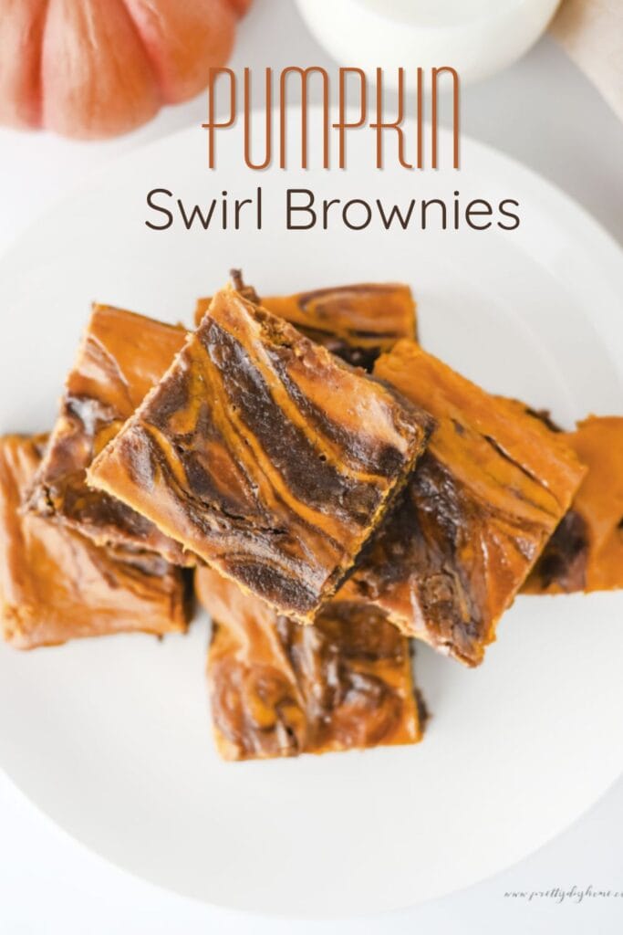 Pinterest graphic for Pumpkin Swirl Brownies featuring fudgy chocolate brownies with a creamy pumpkin swirl and the title "Pumpkin Swirl Brownies."