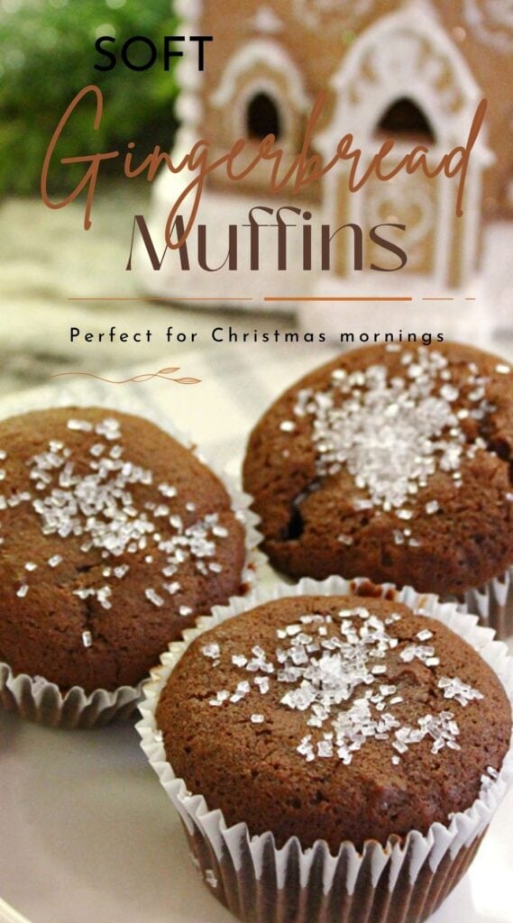 Soft gingerbread muffins topped with sparkling sugar beside a gingerbread house with text reading Perfect for Christmas Mornings.