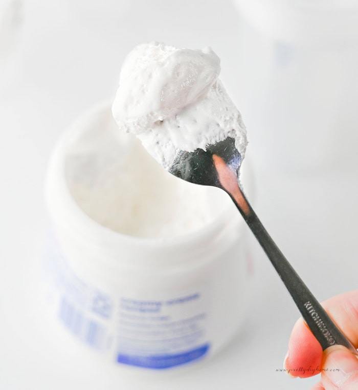 Spoonful of marshmallow fluff for making ghost chocolate milk.