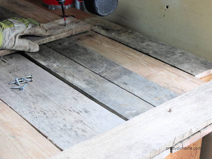 DIY Halloween pallet gravestone with cross pieces attached to hold the vertical boards together.