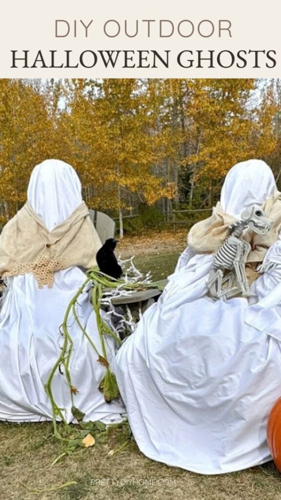 A Pinterest graphic shows two DIY outdoor Halloween ghosts dressed in white fabric and cream shawls in a rustic autumn yard display.