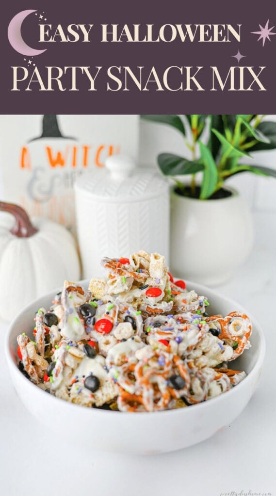 Easy Halloween party snack mix with white chocolate cereal, pretzels, Halloween M&Ms, and colorful sprinkles.