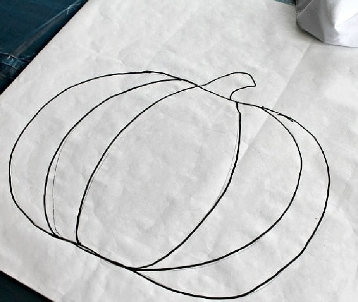 Hand drawn pumpkin outline template for a DIY painted pumpkin pillow.